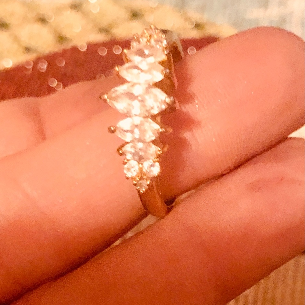 VINTAGE AVON RING ~ MULTIPLE MARQUEE SHAPED FAUX DIAMONDS. 
SHINEY GOLD TONE.